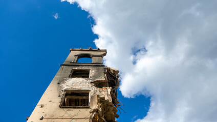destroyed and burned houses in the city during the war in Ukraine - obrazy, fototapety, plakaty