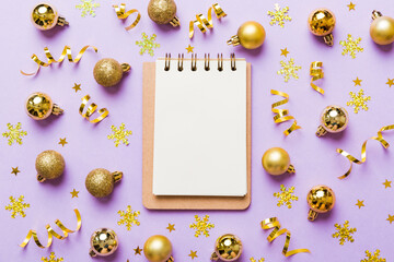 Fototapeta premium Christmas blank greeting card mock-up scene. Creative layout made of Christmas tree branches and paper card note. Flat lay. Nature New Year concept