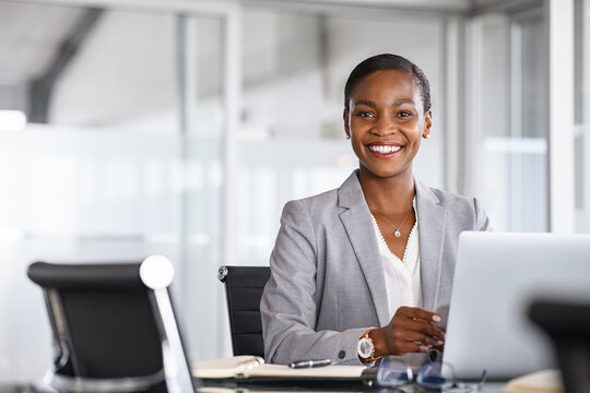 Portrait of smiling black businesswoman looking at camera
