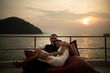 Happy moments of interracial couples on a yacht The couple had their honeymoon at one of Asia's