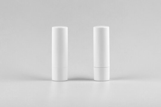 white lipstick tube on white background. white unbranded lipstick tube mock up. branding identity lipstick tube mockup concept. blank label