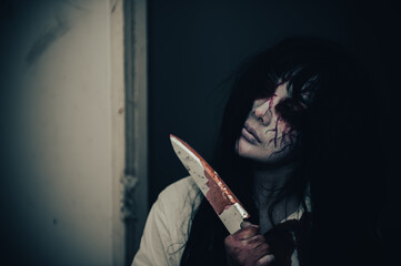 Portrait of asian woman make up ghost,Scary horror scene for background,Halloween festival...