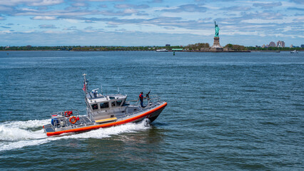 U.S. Coast Guard Response Boat - Medium and Statue of Liberty