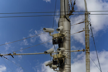 City CCTV cameras against the blue sky