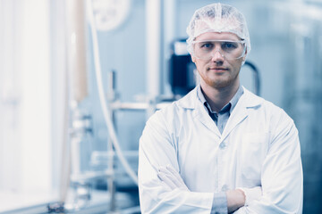 portrait male scientist worker in medicine factory research laboratory plant technician in hygiene...