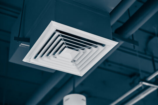square air conditioning in office. air duct pipe hole grill for wind flow spreader