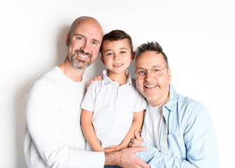 Happy same sexe couple man with adopted child on white background