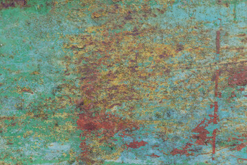 Texture of wall with brass and aqua patina.