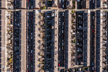 Aerial view directly above rows of back to back terraced house in a UK city