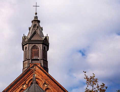 General view and architectural details of the brick belfry built in 1875 and the Catholic Church of the Immaculate Conception of the Blessed Virgin Mary in Ceranów in Mazovia, Poland.