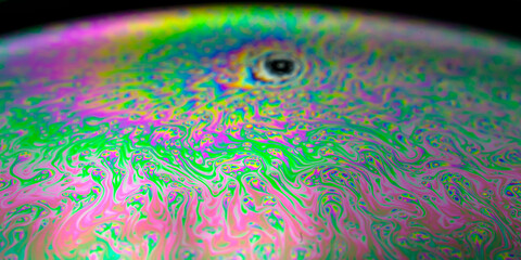 Iridescent multicolored bright abstract soapy water background. Space background for screensaver.