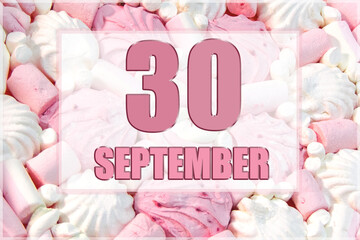 calendar date on the background of white and pink marshmallows. September 30 is the thirtieth day of the month