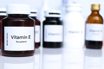 Vitamin E pills in a bottle, food supplement or used to treat disease
