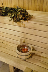 Interior details Finnish sauna steam room with traditional sauna accessories
