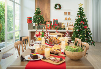 Christmas party food. A celebration dinner with a turkey, wine, champagne on Merry Christmas Eve Xmas on holiday at home. People lifestyle. Thanksgiving day