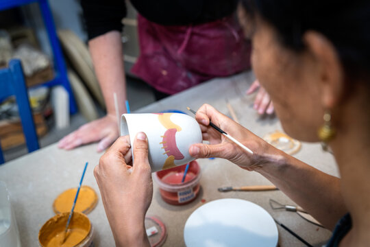 Pottery. Painting pottery.