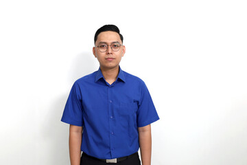 Young Asian employee standing against white background with copyspace