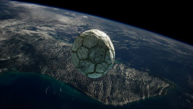 old soccer ball in space on Earth orbit