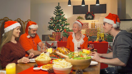 A group of caucasian. Portrait of western white family have a celebration dinner in party on Merry Christmas Eve Xmas on holiday at home. People lifestyle. thanksgiving holiday