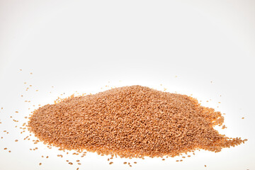 Grain and hat on a white background. Wheat in a cap and money. Grain and finance.