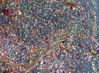Colorful confetti party popper pattern texture background on carpet on the floor. Celebration event
