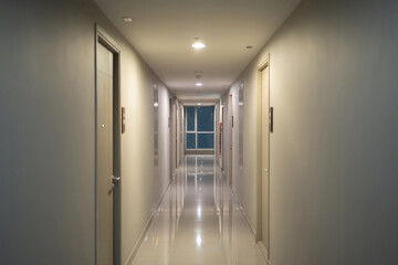 Empty condo, hotel or apartment corridor hall way in condominium building, modern interior design decoration room. Walkway