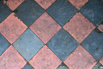 red and black old ceramic floor texture for background; floor decorative design