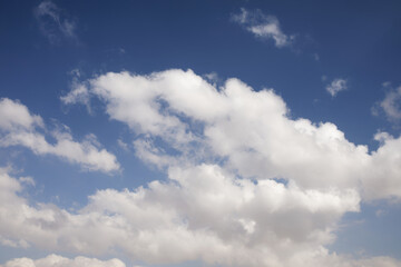 clear blue sky with white clouds