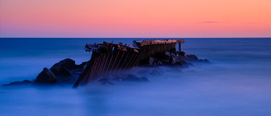 Old dilapidated pier off the coast of Los Angeles, CA. 