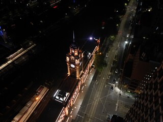 aerial view of Melbourne city skyline at night High rise apartments and office space lit up in the dark displaying the City skyline