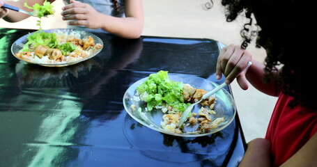 Brazilian kids eating lunch. Hispanic children lunch time3