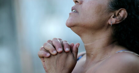 Brazilian woman worshiping to God, person praying2