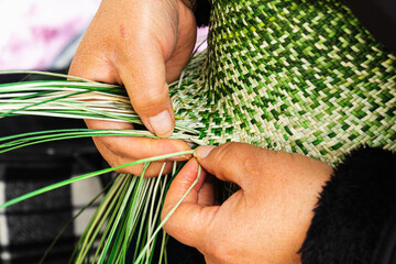 Close up of traditional weaving of ecuadorian Panama Hat or Paja  Toquilla Straw Hats, UNESCO...