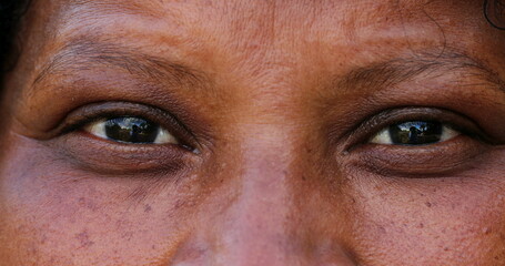 African woman eyes, mature black person macro close-up