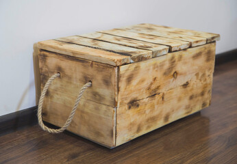 Wooden homemade chest at 45 degree angle. Interior element