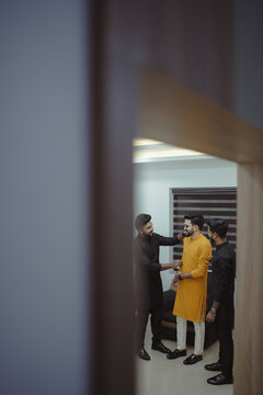 Muslim Men Getting Ready for Wedding