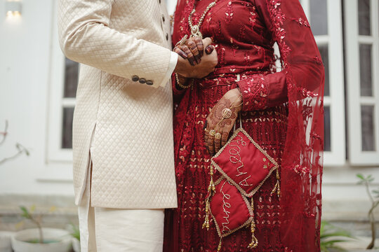 Indian Wedding Couples Holding Hands