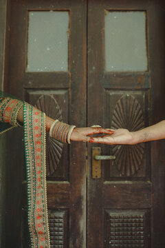 Indian Wedding Couple Holding Hands 