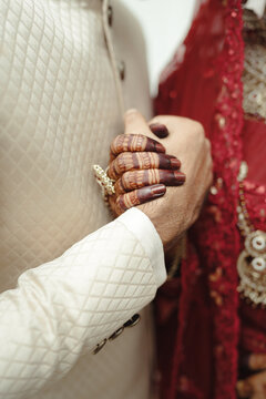 Indian Wedding Couple Holding Hands 