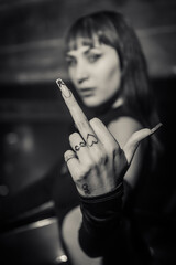 Obraz premium Buenos Aires, Argentina; 08-24-2022: a beatiful girls posing for a photo at a party. Young people dancing in night club party. selective focus. Long exposure. Moving lights. party concept. Party night