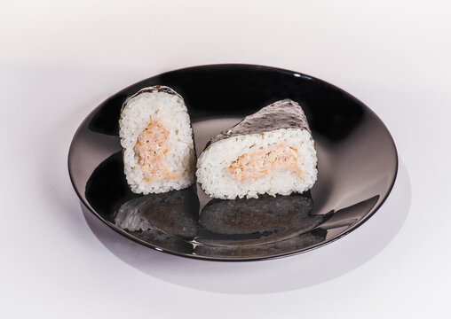 Korean triangle kimbap Samgak made with nori, rice and tuna fish, similar to Japanese rice ball onigiri, square format