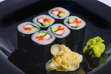 Sushi roll Snow crab, with crab meat. Sushi roll with rice, cream cheese, avocado, salmon. California. Sushi menu. Japanese kitchen, restaurant.