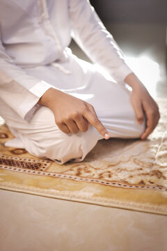 Portrait of Indian Muslim Boy Praying at Home