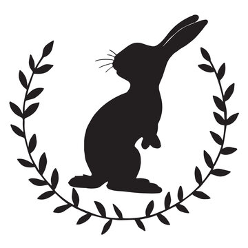 recommend clip art: vector drawing, vintage frame with easter bunny silhouette. minimalistic design, wreaths of branches and a silhouette of a rabbit