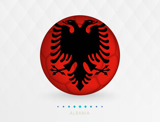 Football ball with Albania flag pattern, soccer ball with flag of Albania national team.