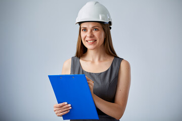 Woman engineer writes on tablet. Isolated female worker portrait.