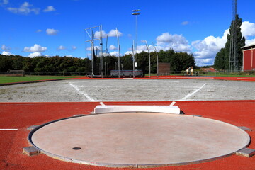 Shot put start. Throwing heavy ball athletics. Bålsta, Stockholm, Sweden, Europe.