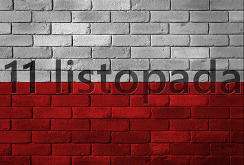 Flaga Polski namalowana na ceglanym murze z napisem święta narodowego 11 listopada - obrazy, fototapety, plakaty