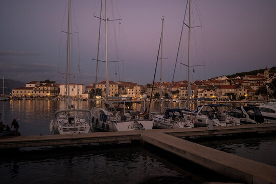 Sailing boats anchored in the town of Postira on Brac island, Croatia for the night