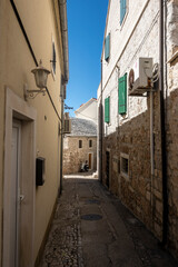Obraz premium Beautiful, narrow streets of Bol, famous town on Brac island, Croatia